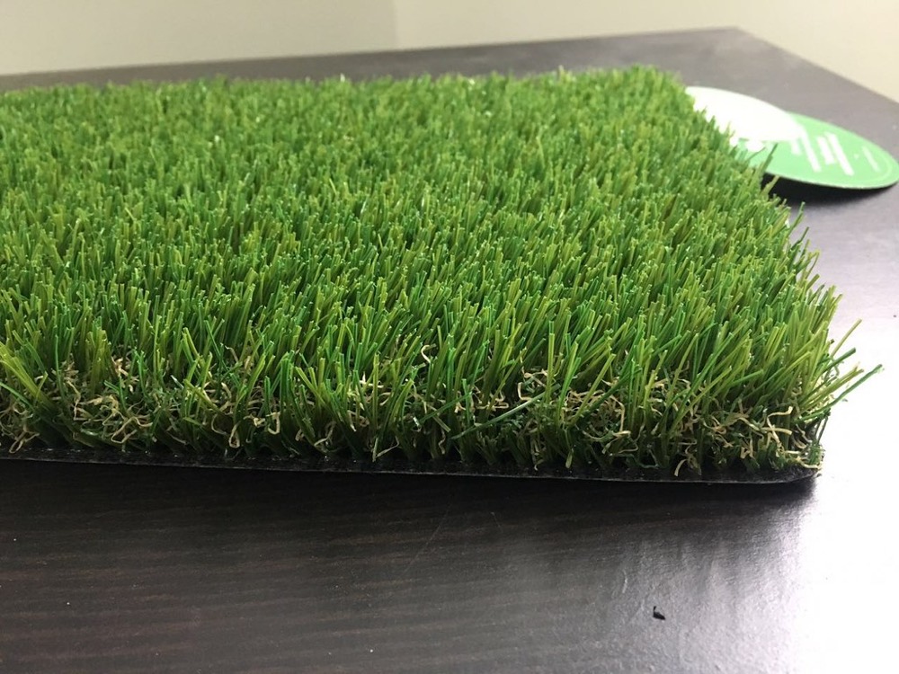 Close-up of artificial turf blades and thatch layer